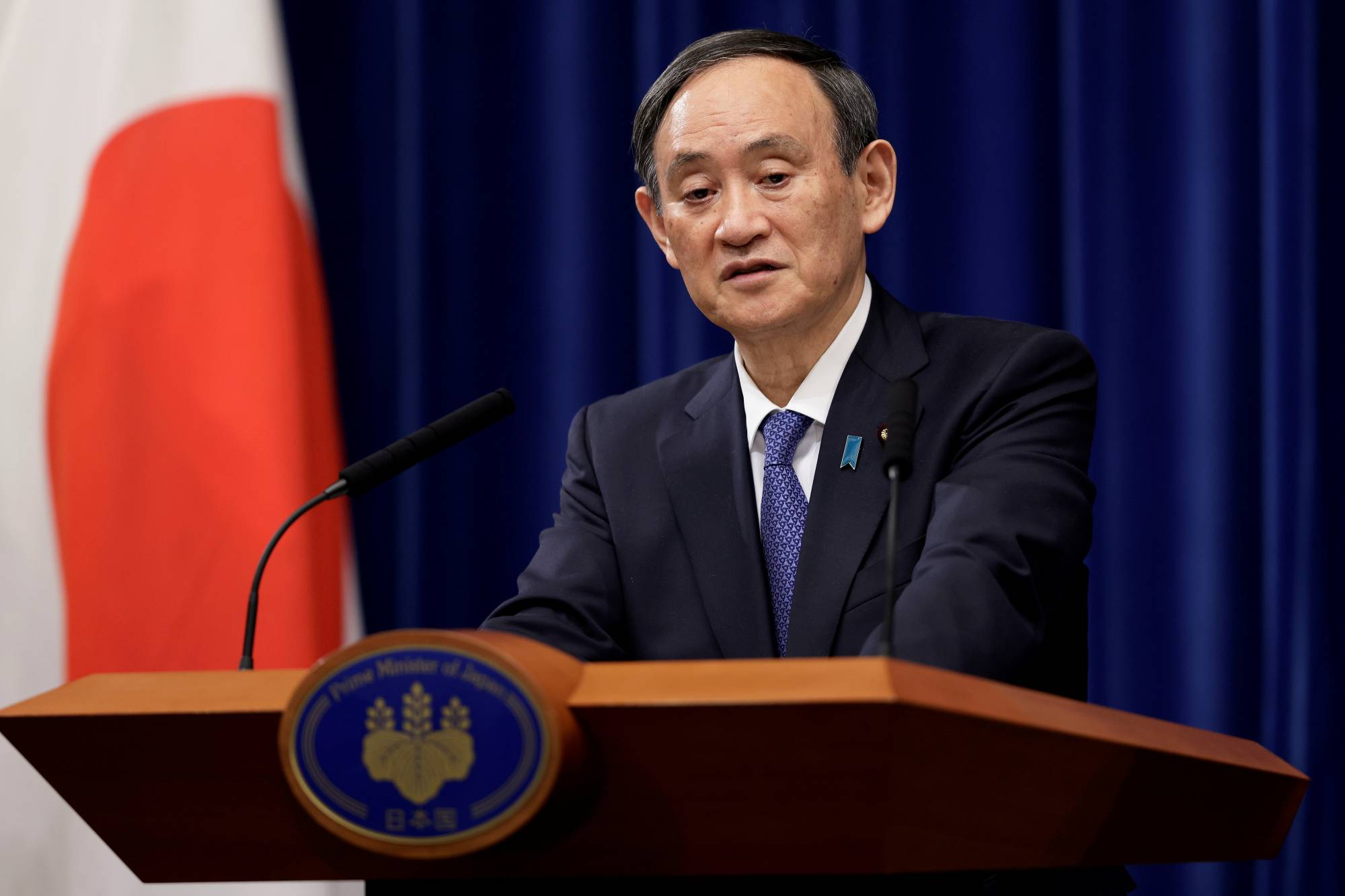 Yoshihide Suga | POOL / VIA REUTERS