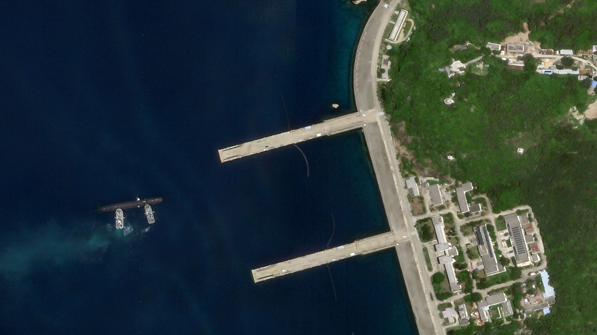 An image from Aug. 19 shows the Type 093 sub getting pushed towards one of Yulin’s piers. China has built-up its submarine force in recent years and greatly outclasses other claimants in the South China Sea, but still remains at a disadvantage to the United States. 