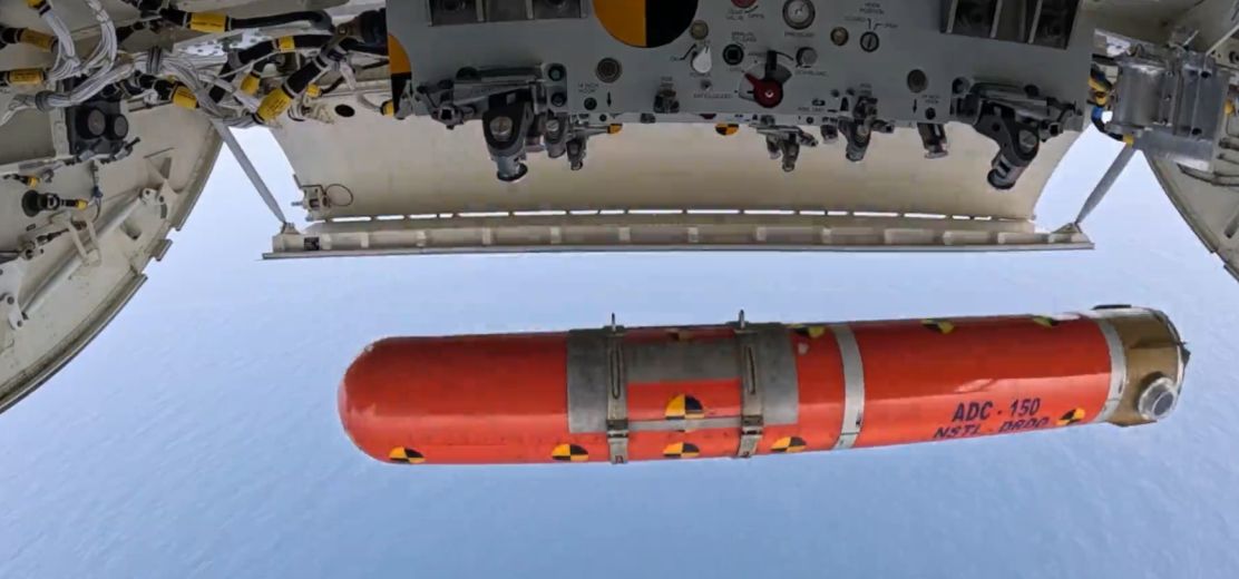 A large orange object with black and yellow markingsDescription automatically generated with medium confidence