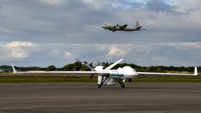 Japan Coast Guard Unmanned Aerial Vehicle SeaGuardian and JMSDF P-3C at Hachinohe Air Base 