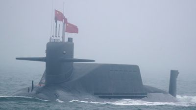 A new type 094A Jin-class nuclear submarine Long March 10 participates in a parade to commemorate the 70th anniversary of the founding of the Chinese People’s Liberation Army Navy, near Qingdao, April 2019