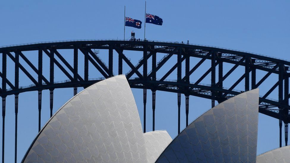 Australian flags are seen at half mast on the Sydney Harbour Bridge, following the death of Prince Philip, Duke of Edinburgh, in Sydney, Australia, April 10, 2021
