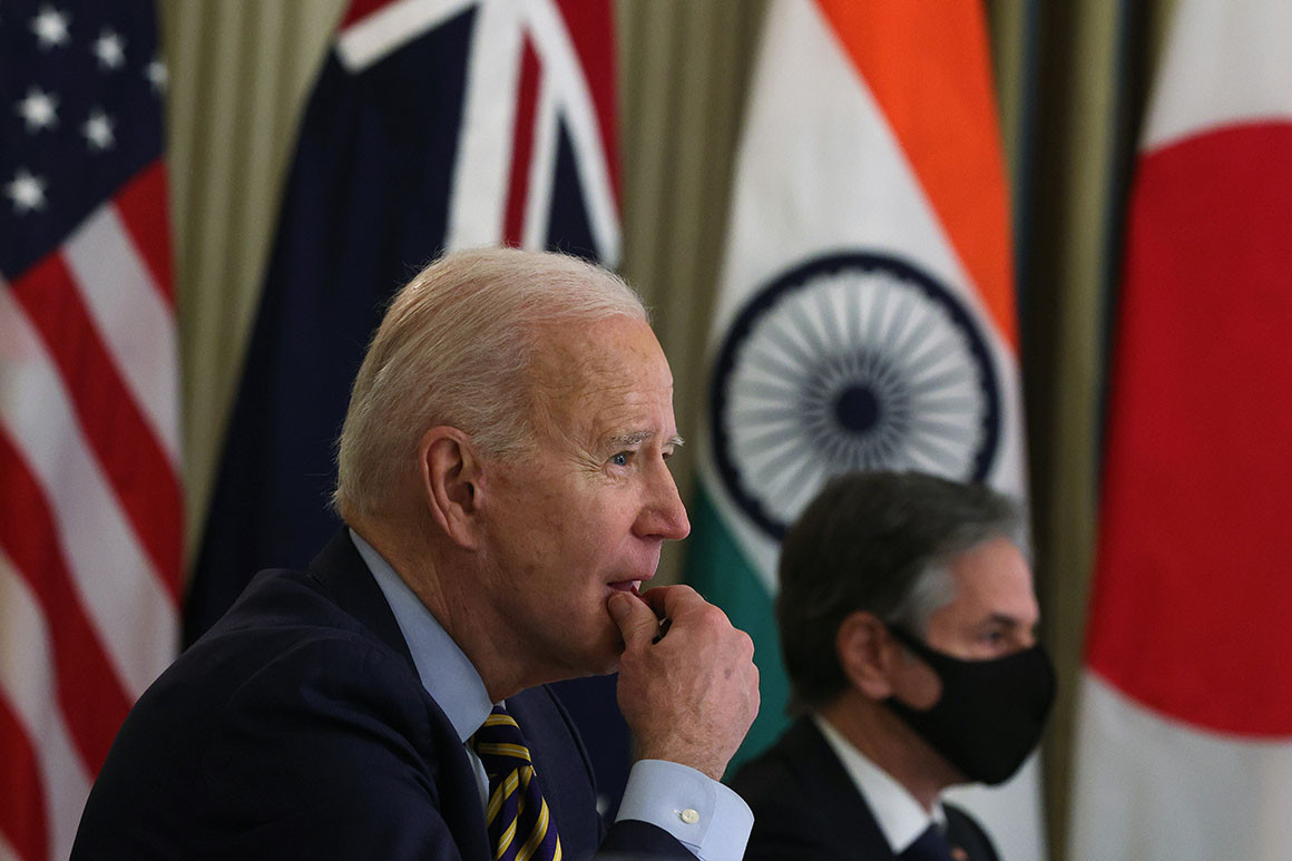 President Joe Biden (left) and U.S. Secretary of State Anthony Blinken (right) participate in a virtual meeting. 