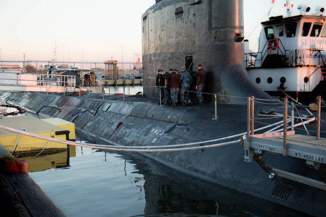 We-walked-onto-to-the-submarine-pier-at-Naval-Station-Norfolk-as-the-sun-was-setting-and-the-crew-members-were-loading-a-special-forces-operation-box-onto-the-Warner-.jpg